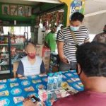 Maling rokok setelah dihajar massa di Kota Palangkaraya, Kalteng. (foto: borneo24/koranbanjar.net)