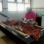 Mayat Udiah saat dibawa ke rumah sakit setempat. (foto: Borneo24/koranbanjar.net)