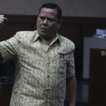 Dilumuri ke Muka M Kece, Irjen Napoleon Sudah Siapkan Kotoran Manusia di Rutan Bareskrim. Irjen Napoleon Bonaparte saat menjalani sidang kasus suap penghapusan red notice Djoko Tjandra di Pengadilan Tipikor, Jakarta, Rabu (10/3/2021). [Suara.com/Angga Budhiyanto]