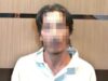Pelaku pembunuhan, Abdul Fuad alias Adul Warsiman saat menyerahkan diri ke Mapolres Banjar. (foto:ist)