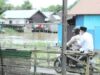 NAIK MOTOR – Wabup HSS dibonceng naik motor menghadiri acara maulid Nabi Muhammad Saw. (foto: ist)
