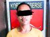 Tersangka saat diamankan pihak kepolisian.