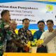 Asisten Pemerintahan dan Kesra Setda Kabupaten Lamandau Triadi Eka Asi Jayadiputera, S.STP, M.Si., saat melakukan peresmian listrik Desa Tamiang bersama PLN dan Forkompimda Kabupaten Lamandau. (Foto: PLN UID Kalselteng/Koranbanjar.net)