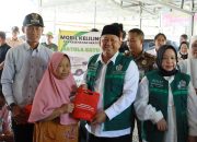 Bupati Barito Kuala Tinjau Langsung Layanan Mobil Keliling Cek Kesehatan Gratis dan Administrasi Kependudukan